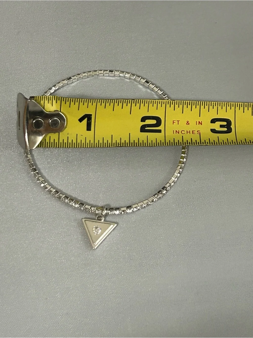GUESS Silver-Tone Triangle Charm Rhinestone Stretch Bracelet